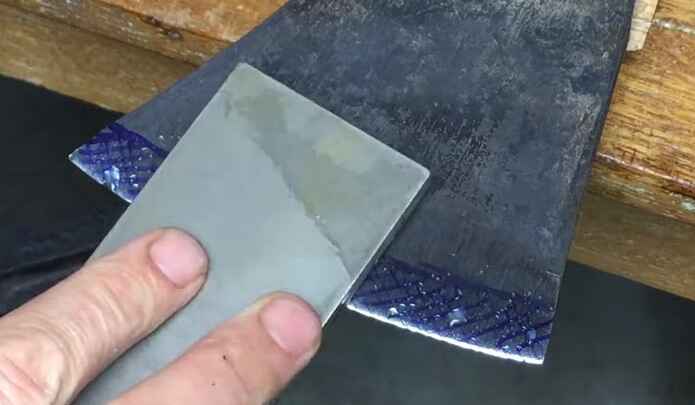 How to Sharpen a Felling Axe Using a Whetstone