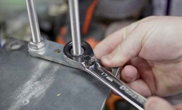using a combination wrench